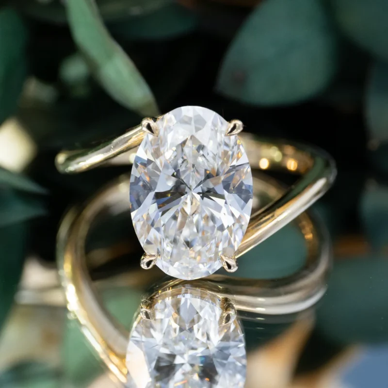 Vibrant Solitaire Ribbon Comfort Fit Oval Engagement Ring 1